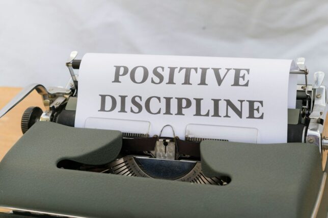 a close up of a typewriter with a piece of paper on it
